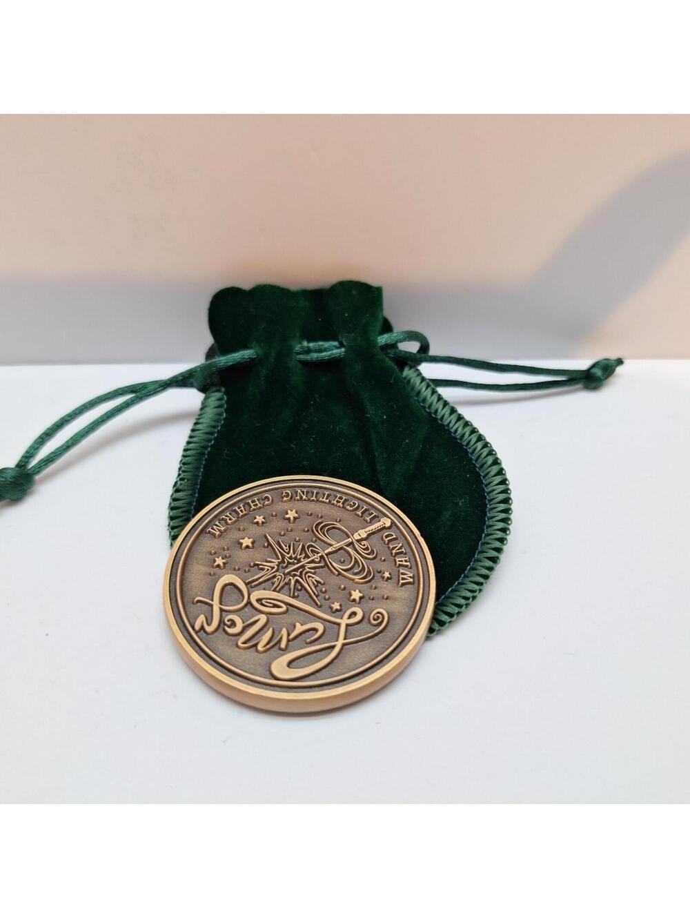 Harry Potter, Lit Joy Collectible Coin, Lumos Coin with Green Felt Bag Holder